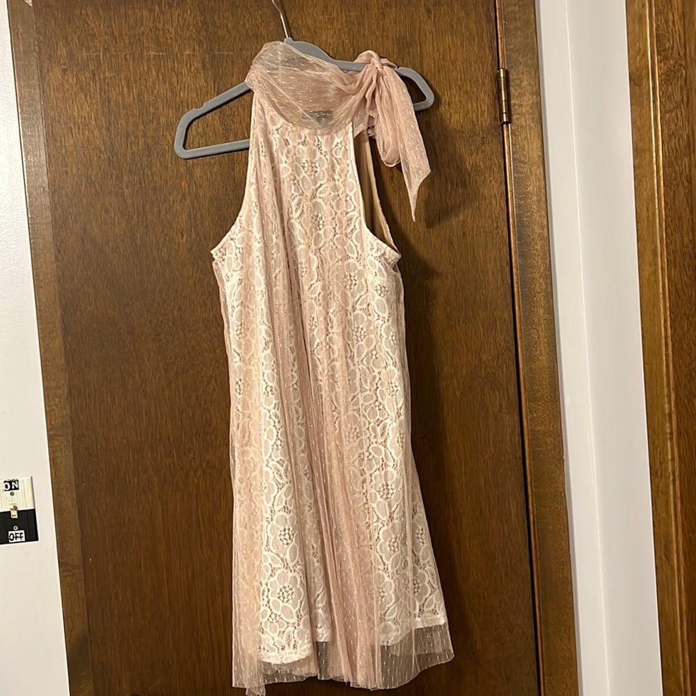 Unique dress with tie at the neck. FREE SHIPPING